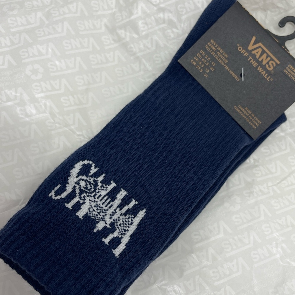 VANS "Off The Wall" Crew socks 
New with the tag authentic Vans socks (1 pair)